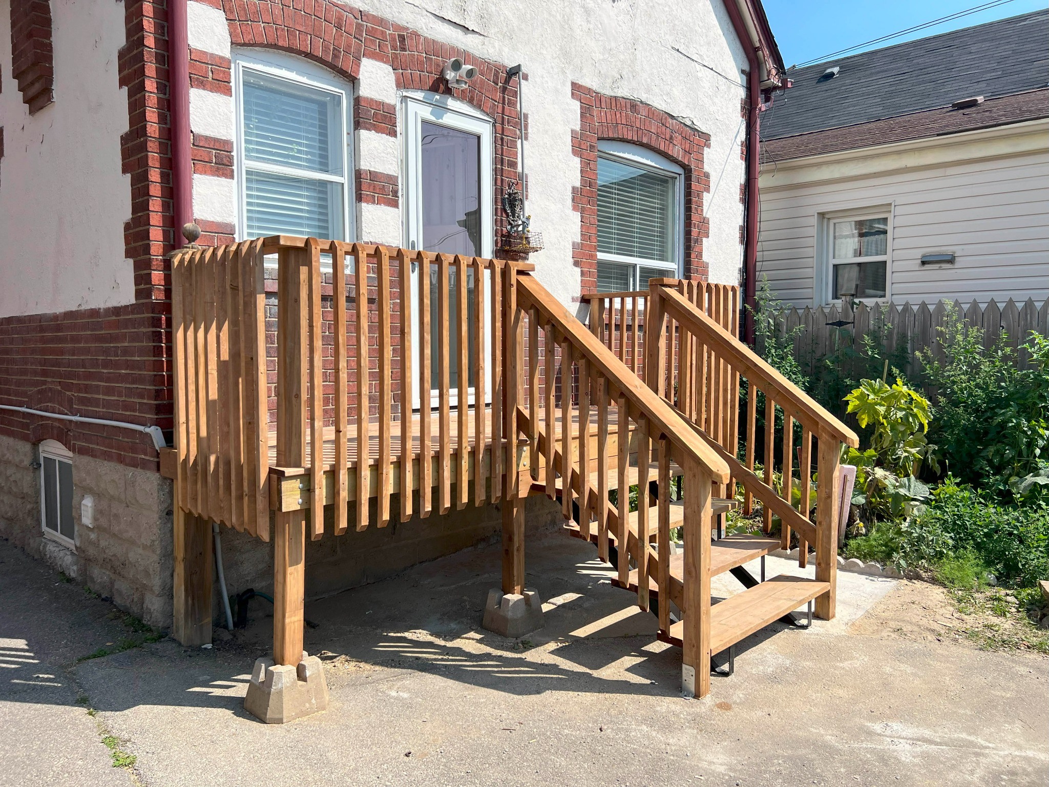 Custom cedar deck, railings and exterior carpentry
