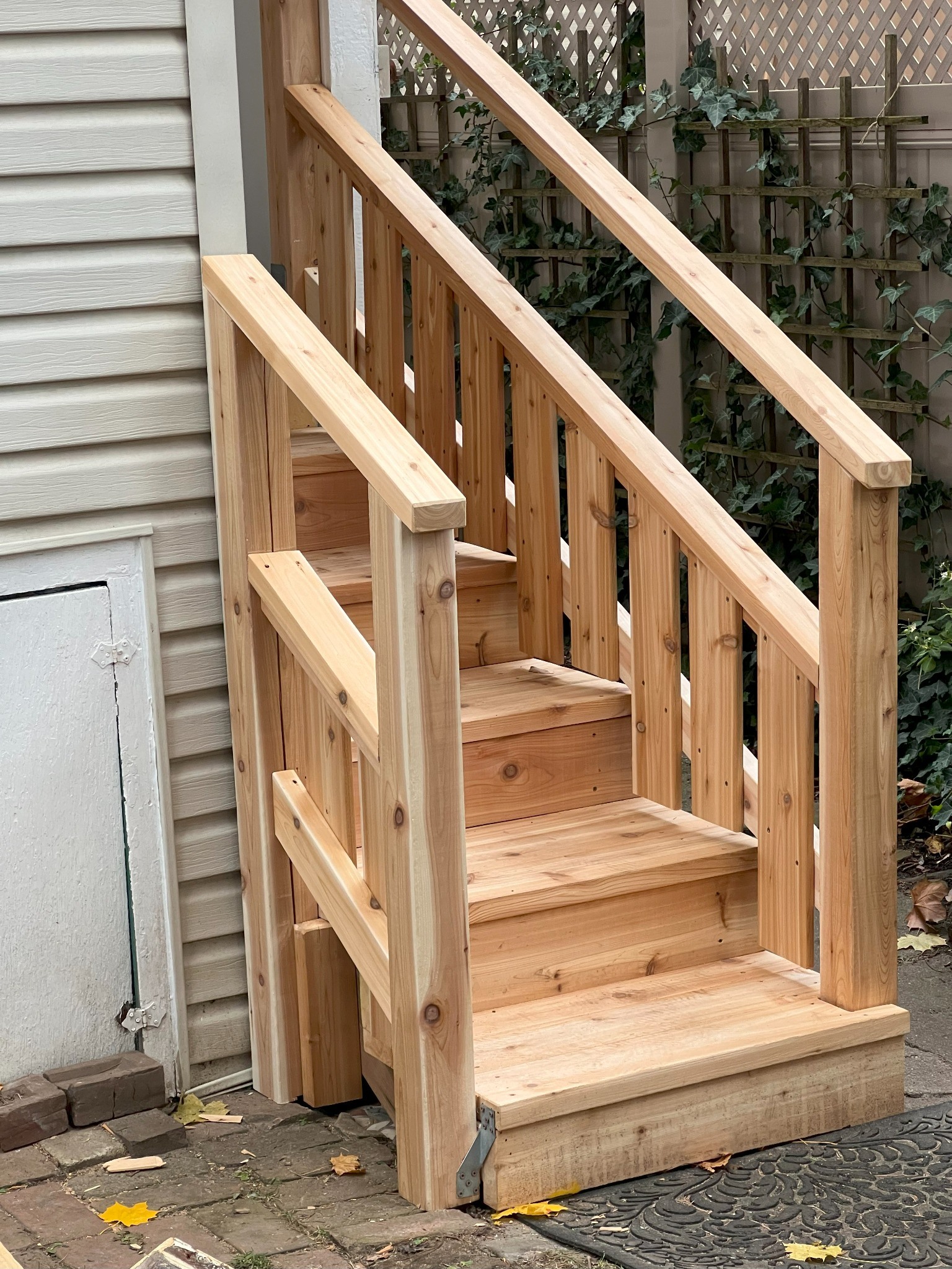 Custom cedar exterior stairs and railings
