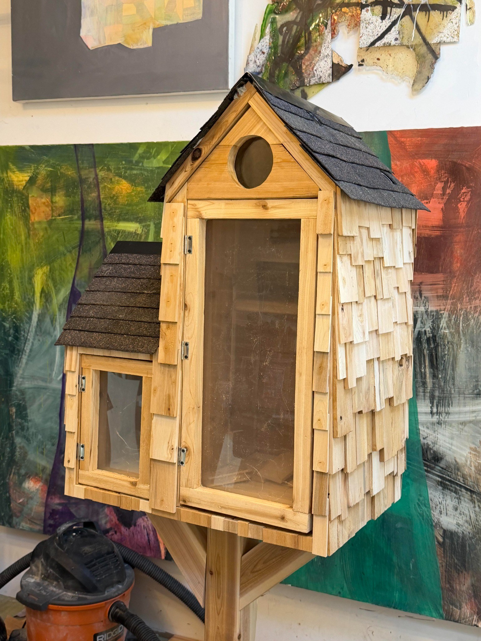 Handcrafted cedar Little Library under construction in the workshop